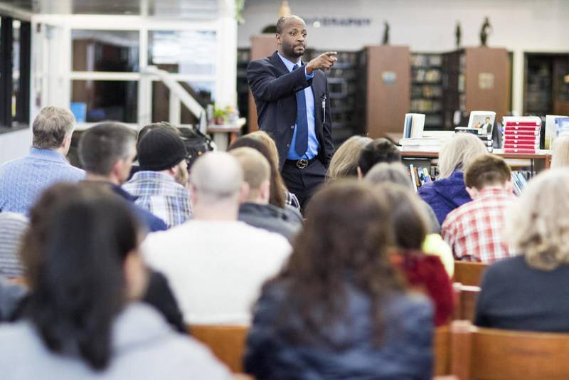 Crystal Lake Community High School District 155 Superintendent Johnnie Thomas holds a town hall meeting for residents Monday at Cary-Grove High School. Cary-Grove Principal Jay Sargeant has resigned his position, effective July 1.