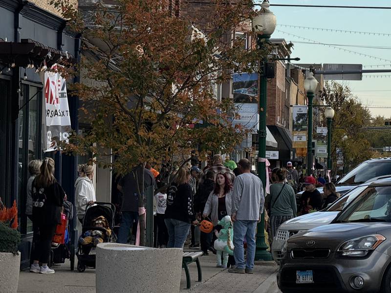 Trick-or-treaters and their parents flood Liberty Street in Morris in pursuit of candy Thursday night for Downtown Trick-or-Treat.