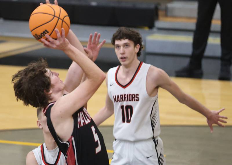 Henry-Senachwine's Jacob Miller eyes the hoop against Woodland during the Tri-County Conference Tournament on Monday, Jan. 26, 2026 at Putnam County High School.