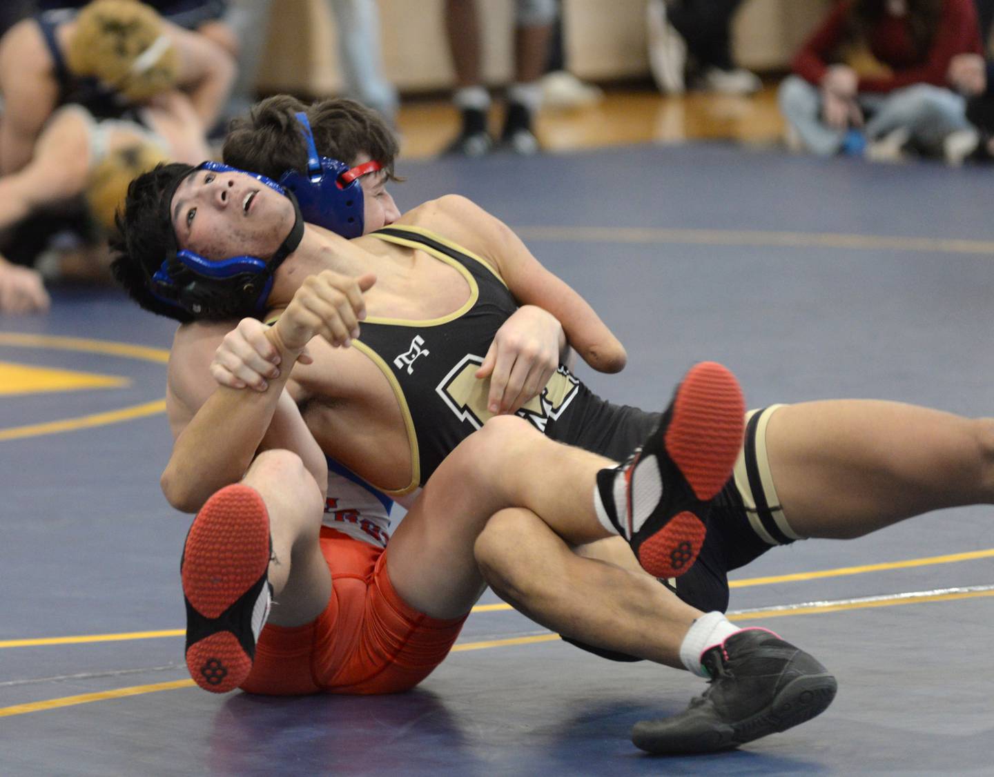 Polo-Forreston's Lucas Nelson tries to escape Oregon's Nelson Benesh in the 132-pound title bout at the Polo Wrestling Invitational on Saturday, Jan. 11, 2025 at Polo High School. Benesh won the match.