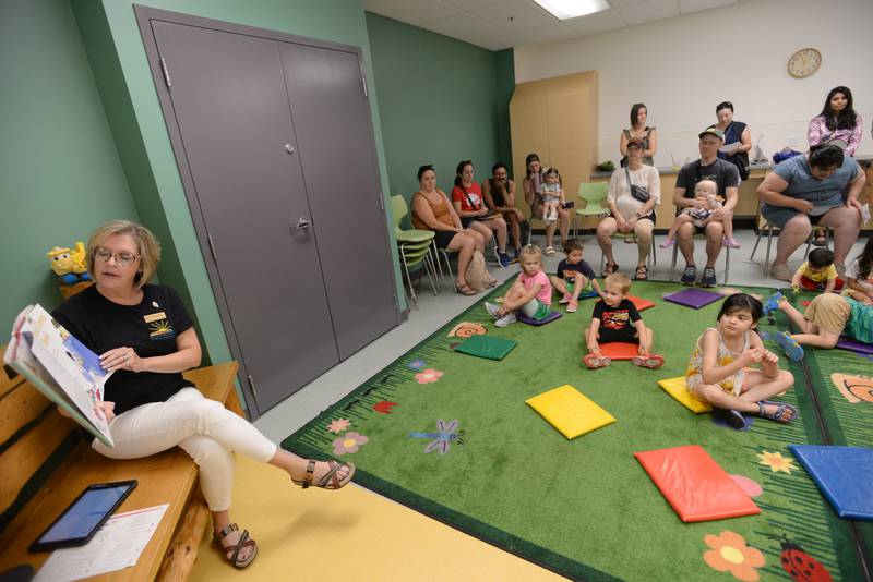 Children's Librarian Margaret Stec reads Once Upon a Book during the La Grange Park Library Grand Reopening Saturday Aug 3, 2024.