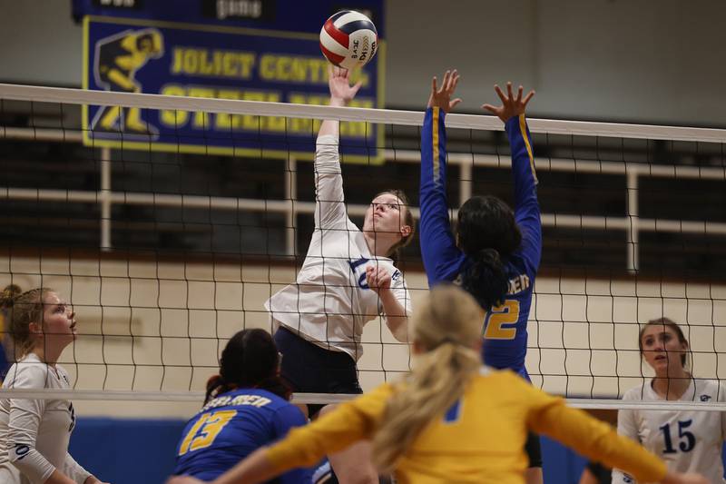 Plainfield South’s Sam Cartwright goes up for the middle kill against Joliet Central on Thursday, Sept. 7, 2023 in Joliet.