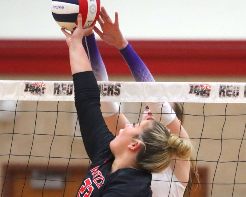 Hampshire’s Anna Schiltz, back, and Huntley’s Abby Whitehouse tussle at the net in girls varsity volleyball at Huntley High School on Thursday, October 23, 2025.