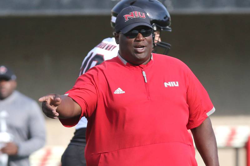 Northern Illinois football head coach Thomas Hammock gives instruction during the first practice of the season Wednesday, Aug. 2, 2023, at Huskie Stadium in DeKalb.