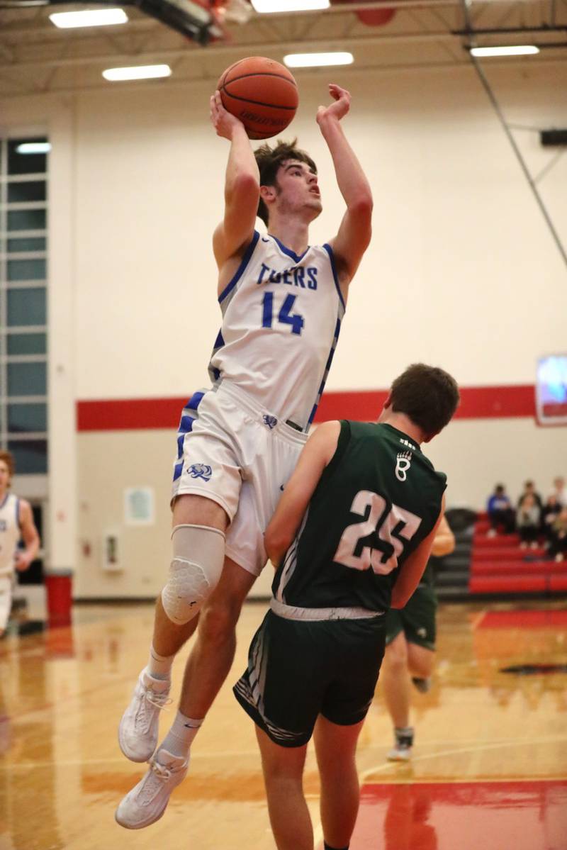 Princeton's Grady Thompson shoots over St. Bede's Logan Potthoff Saturday night in the Colmone Classic.