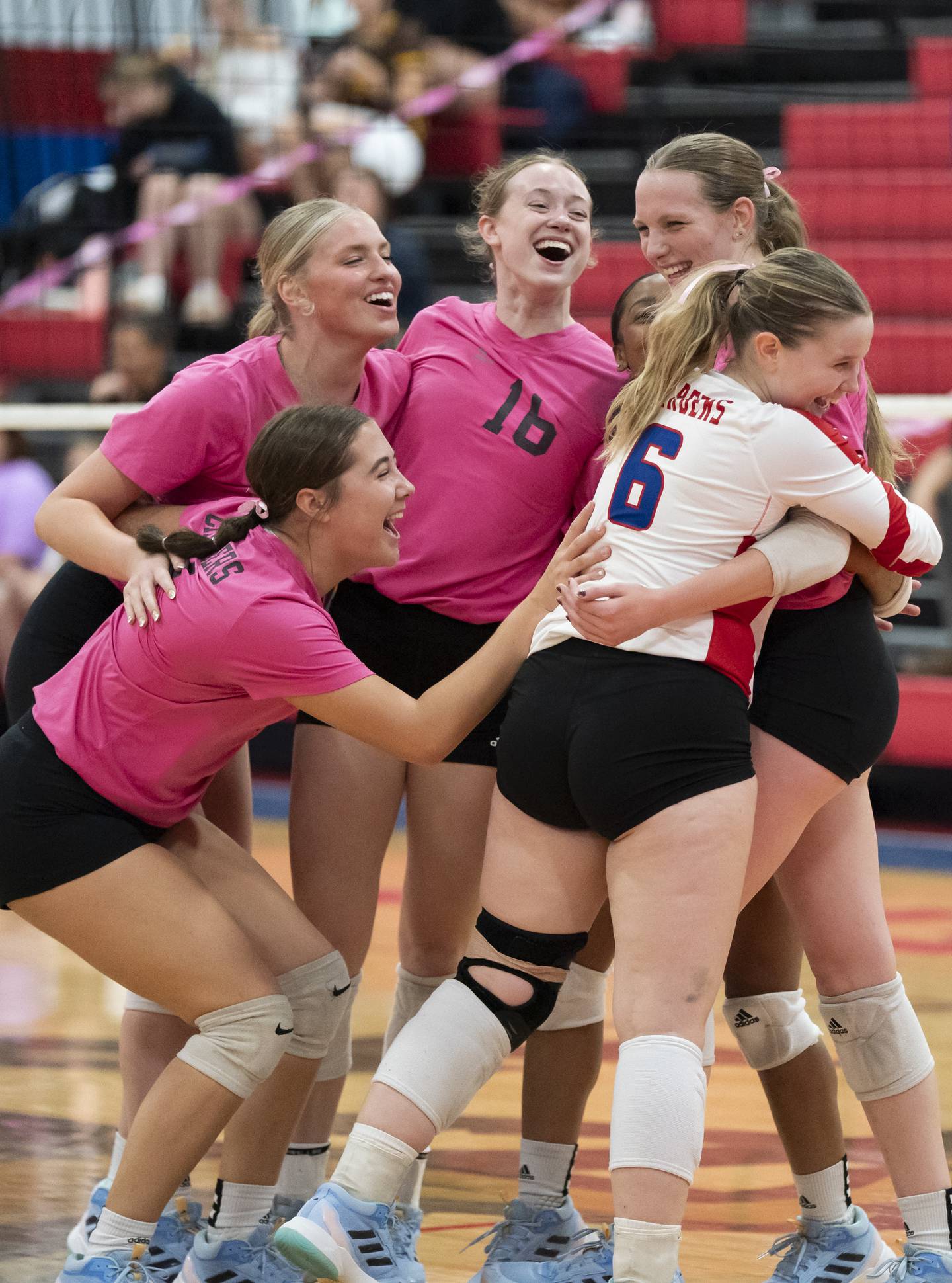 The Dundee-Crown varsity girls volleyball team celebrates after defeating Jacobs in two sets on Thursday, October 16, 2025 at Dundee-Crown High School in Carpentersville. Ryan Rayburn for Shaw Local