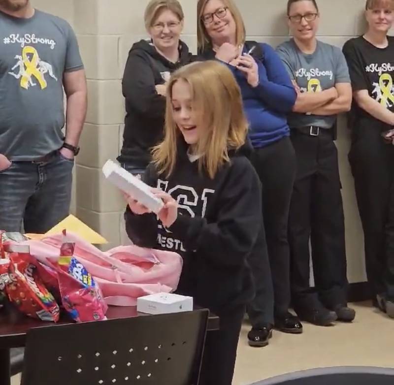 Ky Larkin receives a care package at the Huntley Police Department Jan. 26, 2024. She was diagnosed with germinoma just before Christmas.
