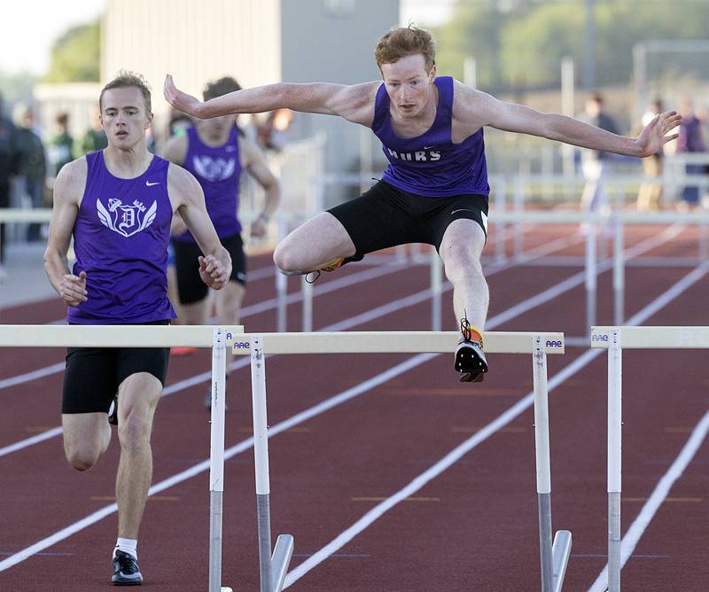 Rochelle’s Hunter Bivins clears a hurdle in the 300 Wednesday, May 20, 2026, at the Rochelle Class 2A boys track sectionals.