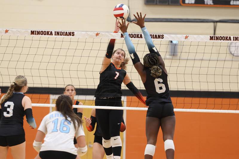 Minooka’s Addison Ciesielski stretches for the shot against Joliet Catholic in September 2024 in Minooka.