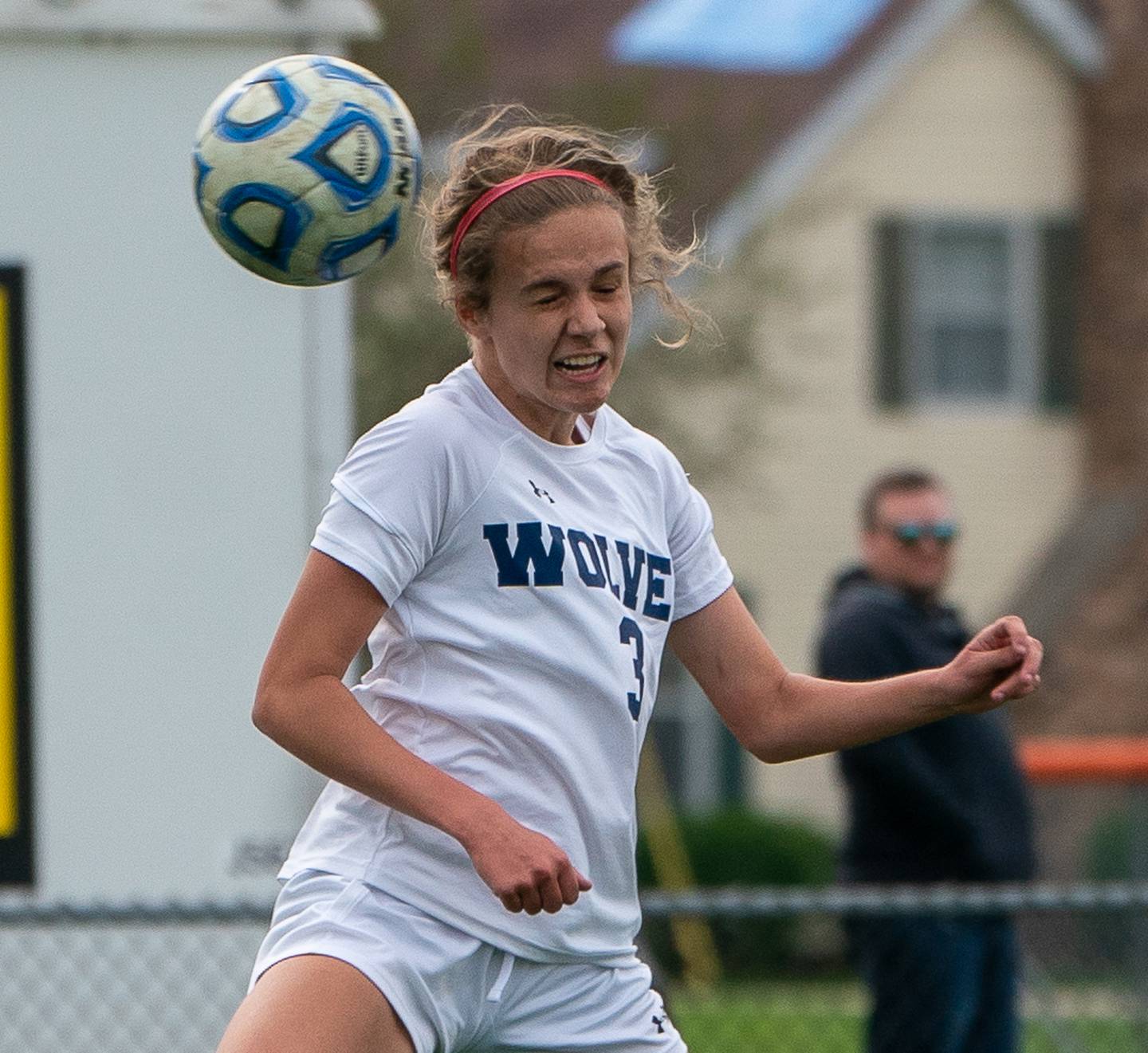 Oswego East's Anya Gulbrandsen (3) goes up for a header against Oswego during a soccer match at Oswego High School on Monday, May 2, 2022.