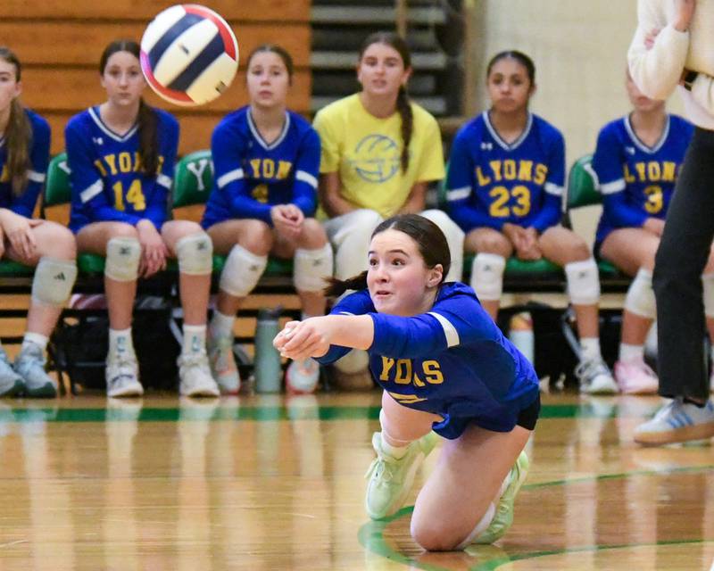 Lyons Township's Avery Lee (5) dives for the ball during the regional title game while taking on York on Thursday Oct. 30, 2025, held at York High School.