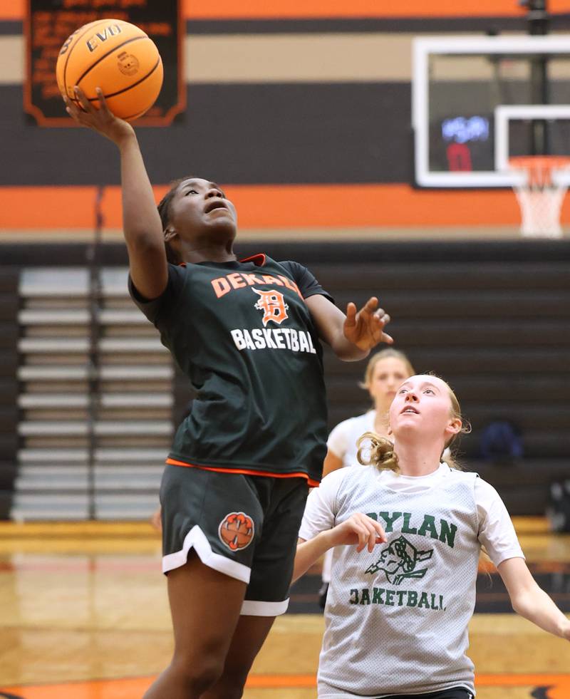 DeKalb’s Kezaria Mitchell goes up for a layup during their summer game against Boylan Monday, June 17, 2024, at DeKalb High School.