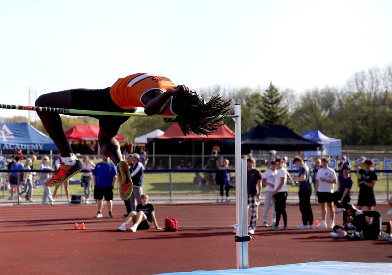 Kaneland’s Fredrick Hassan competes in the high jump during the Kane County boys track and field championships on Friday, May 9, 2025 at St. Charles North.