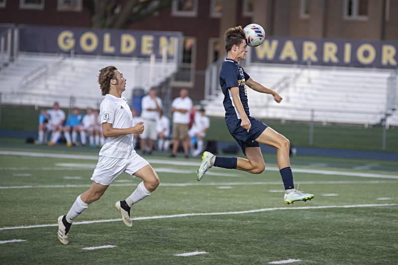 Sterling’s Carter Chance heads the ball against Geneseo Tuesday, Sept. 20, 2022.