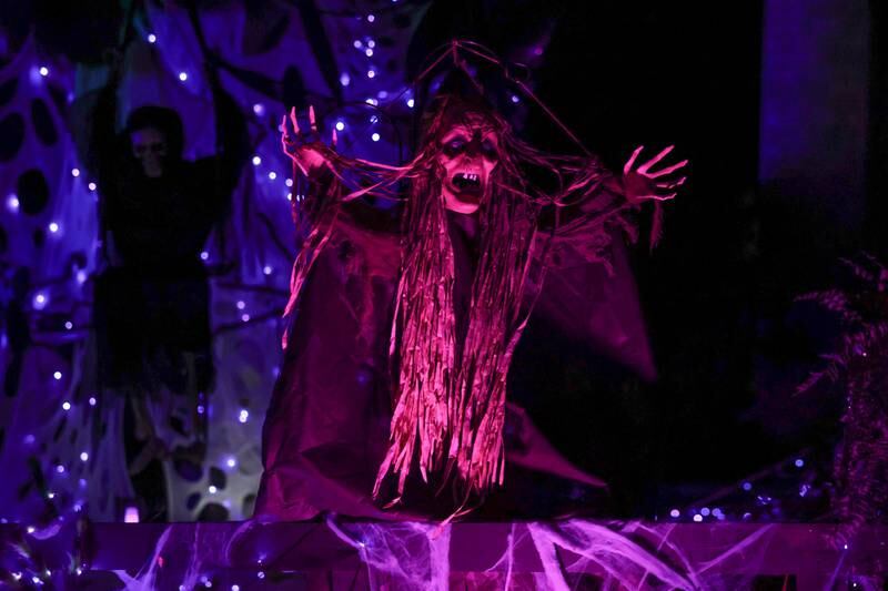 A witch reaches out at the newest Halloween display by Dave Appel HorrorProps, who made national attention with his “Stranger Things” display, on Thursday, Oct. 17, 2024 in Plainfield.