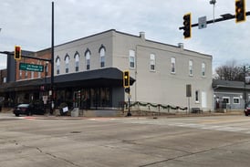 Oswego grants variance to allow downtown building owner to paint rest of brick building