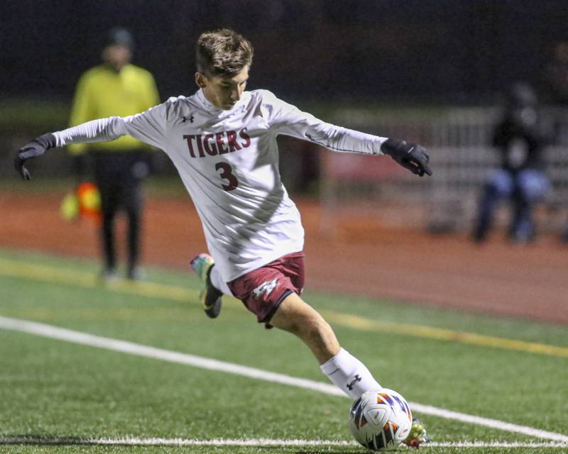 Plainfield North's Dylan Dwyer (3) kicks the ball during Class 3A Naperville Central Regional semifinal soccer match between Plainfield North at Oswego, Tuesday Oct 21, 2025.