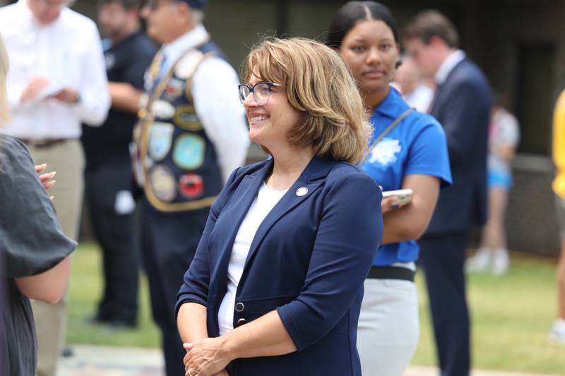 Illinois State Senator, District 49, Meg Loughran Cappel attends a special Flag Day ceremony dedicating a memorial to remember the 28 World War II Submarines that traveled through Joliet on their way to the Pacific theater in Bicentennial Park on Wednesday, June 14, 2023 in Joliet.