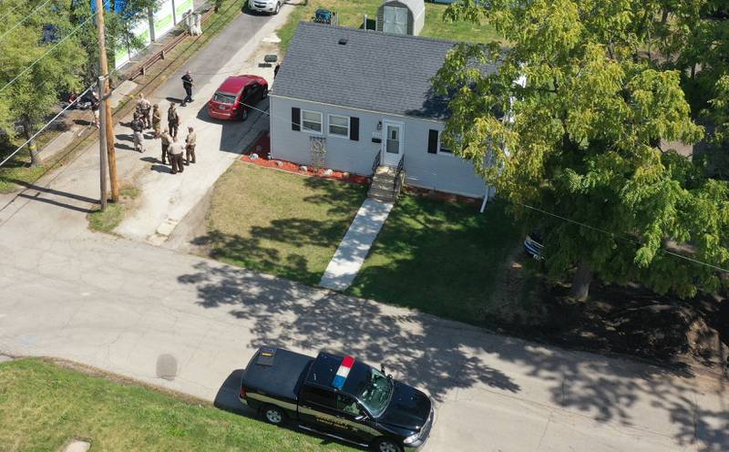 Ottawa Police and La Salle County Sheriff deputies surround a home in the 1500 block of Scott Street just south of U.S. 6 on Wednesday, Sept, 13, 2023 in Ottawa. A suspect had nearly an hour standoff with police around noon and was taken into custody around 1p.m.