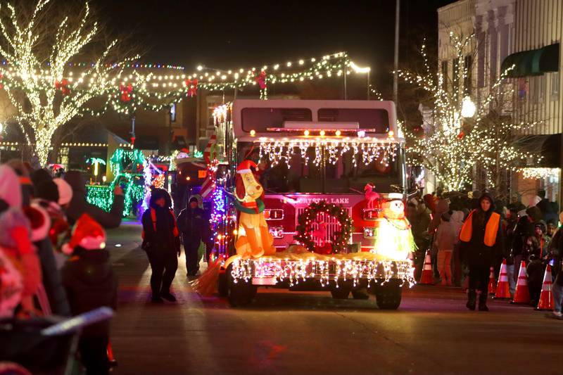 A fire truck appears during the Festival of Lights Holiday Parade in downtown Crystal Lake on Friday, Nov. 29, 2024.