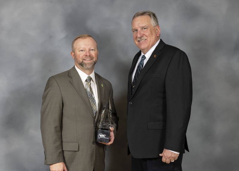Bureau County Farm Bureau was awarded top honors for Group IV for its overall program excellence following its goals for the organization set prior to the program year. Pictured are (from left) Evan Hultine, Bureau County Farm Bureau and newly elected Illinois Farm Bureau vice president and Brian Duncan, newly elected Illinois Farm Bureau president.