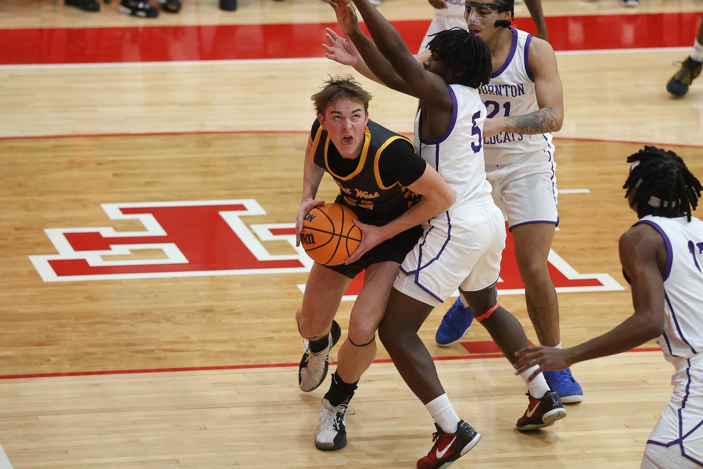 Joliet West’s Ryan Lipke works under the basket against Thornton in the MLK Dream Classic at Homewood-Flossmoor on Monday, Jan 19, 2026 in Homewood.