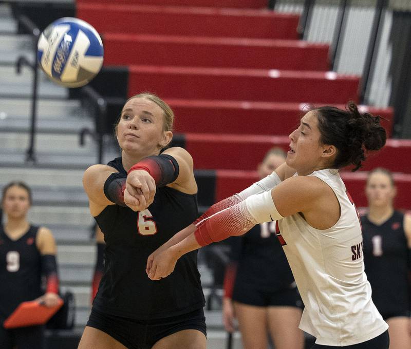 Sauk Valley’s Jess Johns makes a pass in front of teammate Cali Kobbeman against Triton College Wednesday, Nov. 5, 2025, during the Regional IV tournament.