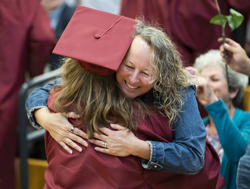 Becky Johnson gives her son Finley a hug during the graduation ceremony for the class of 2022 on Sunday, May 22, 2022, at Richmond-Burton Community High School in Richmond.