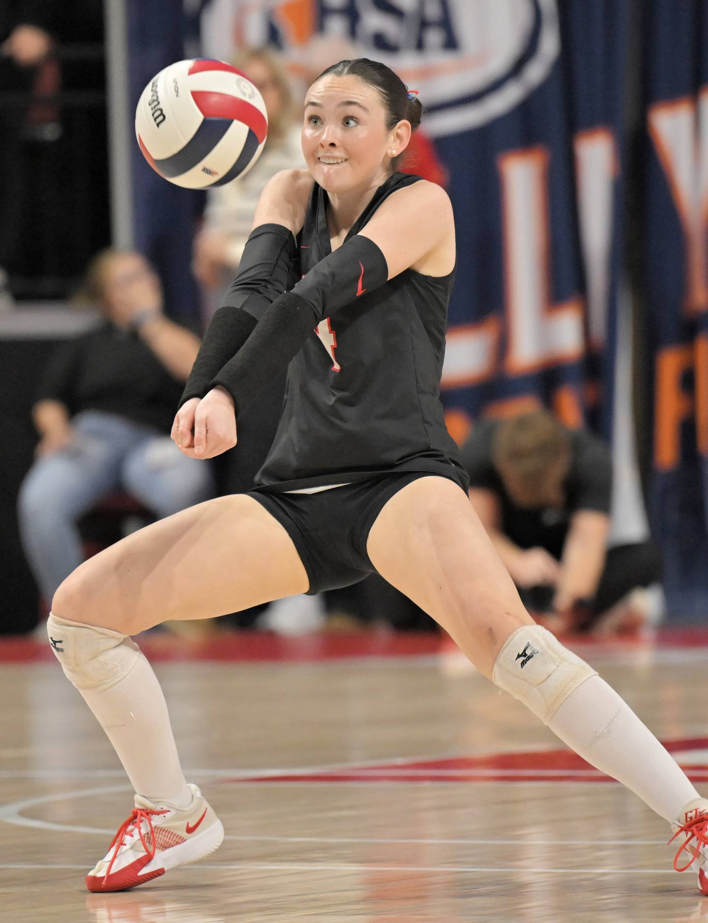 Benet’s Erin Johnson takes a back row shot from Marist in the Class 4A final match at the IHSA girls volleyball state tournament at Illinois State University on Saturday, Nov. 15, 2025