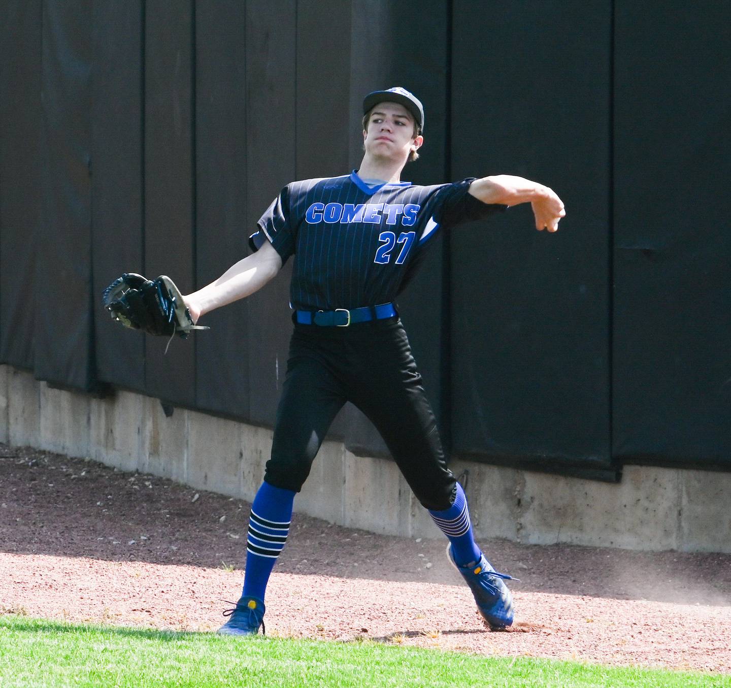 Newman's Brendan Tunink makes a play at the wall during Monday's supersectional against Marquette.