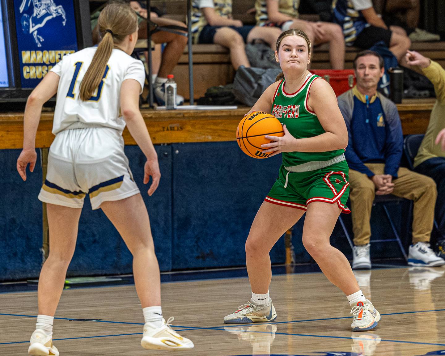 Emma Jereb (5) of LaSalle-Peru holds ball looking for open teammate on Saturday, January 3, 2026 at Marquette Academy in Ottawa.