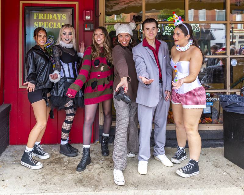 Moe Joes owner Jamie Littel, with camera, and staff at the Plainfield Spooktacular Trick-or-treating event Saturday Oct 25, 2025 in Plainfield.