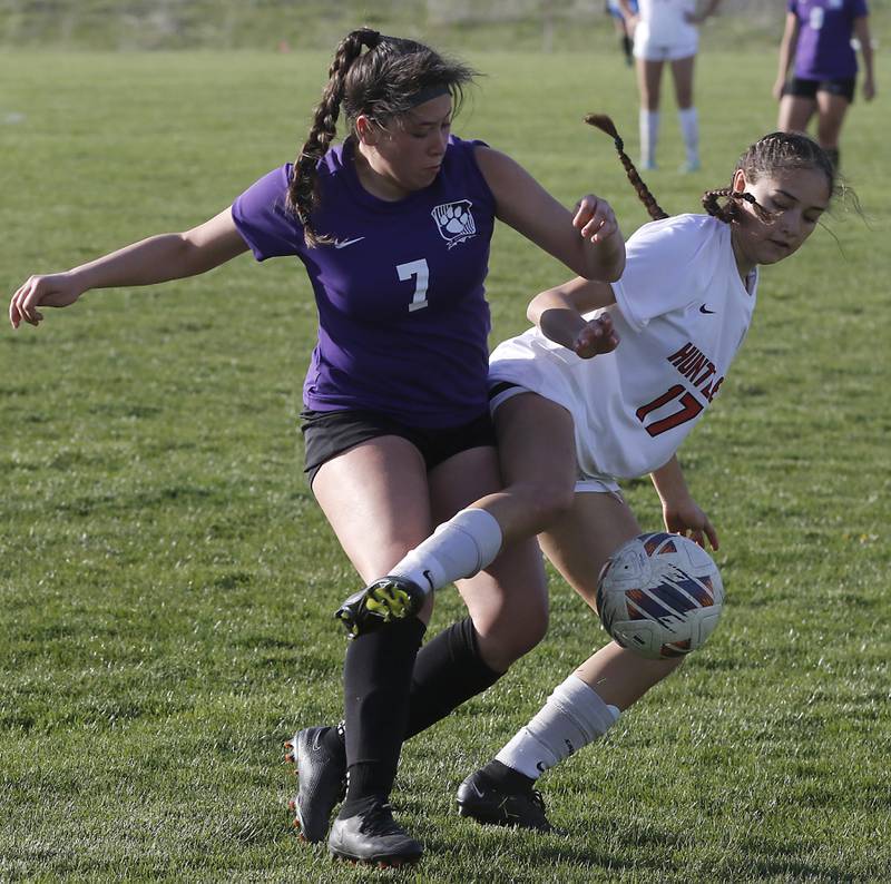 Hampshire's Ilse Marquezand Huntley's Itzel Martinez battle for the ball during a Fox Valley Conference soccer game on Tuesday, April 23, 2024, at Hampshire High School.