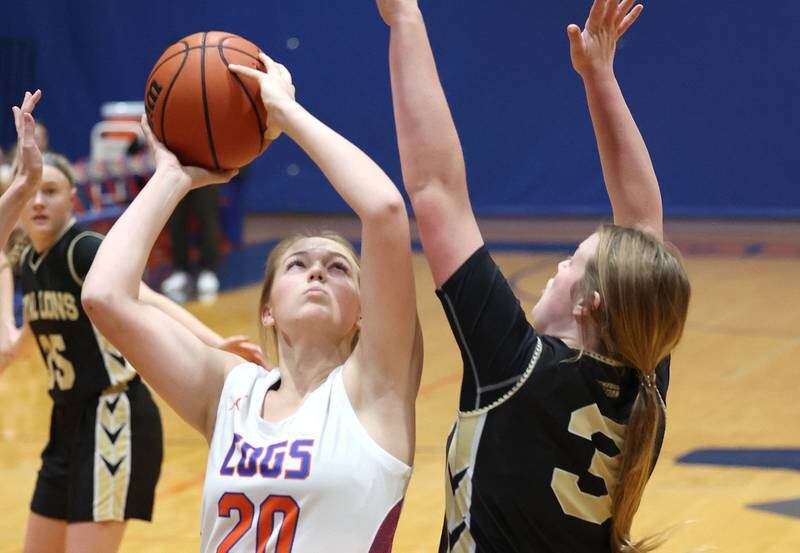 Genoa-Kingston's Bryce Boylen shoots over Rockford Christian's Kaitlin Park during their game Friday, Jan. 13, 2023, at Genoa-Kingston High School.