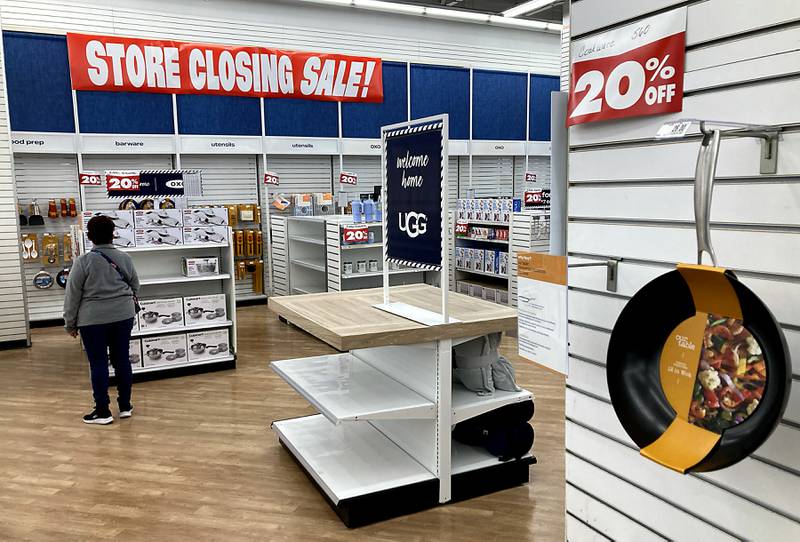 A shopper looks at a cook wear displayed at the Bed Bath & Beyond store at 5786 Northwest Highway in Crystal Lake on Tuesday, Feb. 7, 2023. This store and the Best Buy store at 1561 S. Randall Road in Algonquin recently announced they were closing. While the Best Buy is closing on March 4, Bed Bath and Beyond has not released its closing date.