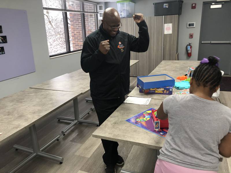 Terry Byrd, a volunteer with Big Brothers Big Sisters of McHenry County, plays board games with "Littles" Kennedi and Kaiden, on Friday, Jan. 19. The local organization needs more adult volunteers to serve its 50-child waiting list.