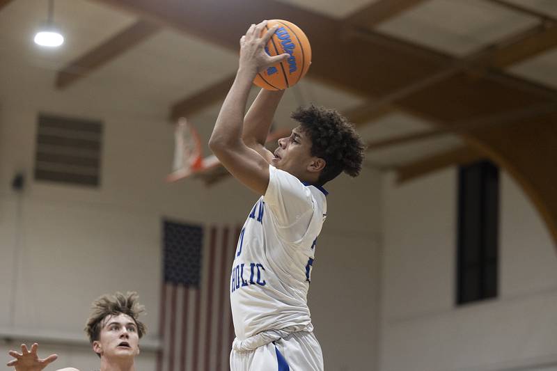 Newman’s Tyson Williams takes a pass against Milledgeville Monday, Feb. 24, 2025, during a Class 1A Regional quarterfinal at Newman High School.