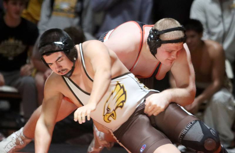 Crystal Lake Central’s Logan Gough battles Jacobs’ Javier Ramirez at 285 pounds in varsity boys wrestling on Tuesday, Jan. 20, 2026 at Crystal Lake Central High School in Crystal Lake.