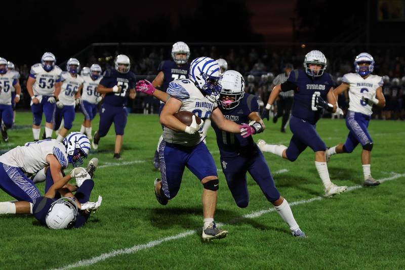 It's full steam ahead for Princeton's Common Green Friday night at Monmouth. The Titans upset the Tigers 31-3.