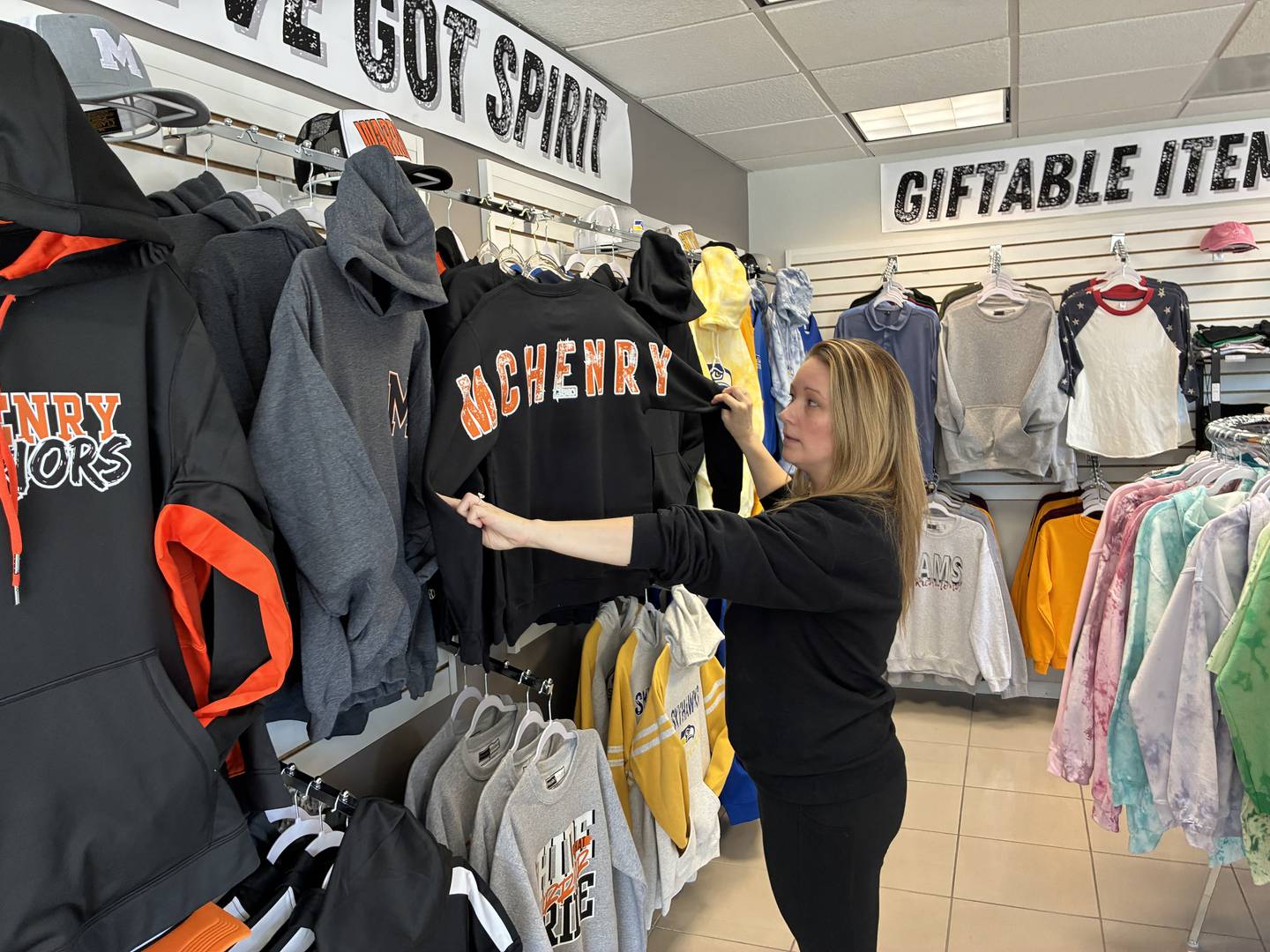 Tiff Freund at Freundly Designs in McHenry on Wednesday, Feb. 11, 2026. By selling "Riverside Strong" apparel for two McHenry stores damaged in a fire, Freund has raised more than $13,000 for the two businesses.