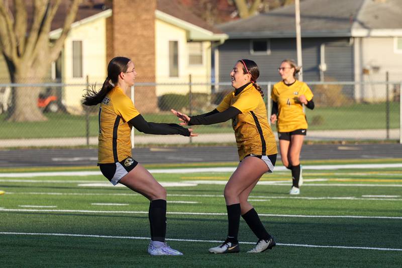 Herscher's Gianni Jaime celebrates scoring a goal with teammate Laney Mohler during the Tigers' 3-2 victory over Bradley-Bourbonnais on Tuesday, April 15, 2025.