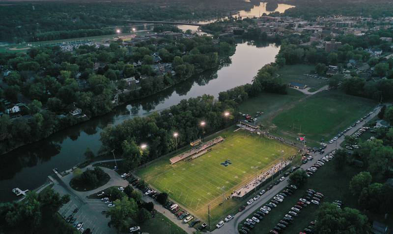 An aerial view of  Gould Stadium as the Fox River meets the Illinois River on Friday, Sept. 26, 2025 in Ottawa. Marquette hosted St. Bede in football.