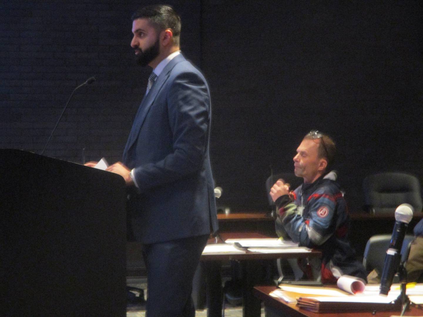 Attorney Karman Bains makes the case for client John Dillon who successfully sought the ouster of  James Lanham (right) and two other candidates from the April 1 city council election in Joliet. Dec. 23, 2024