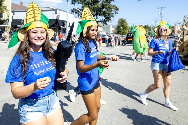 Representative from Southwest Hearing Solutions, dressed as ears of corn, participate in the Grundy County Corn Festival Parade in Downtown Morris on Sept. 28, 2025.
