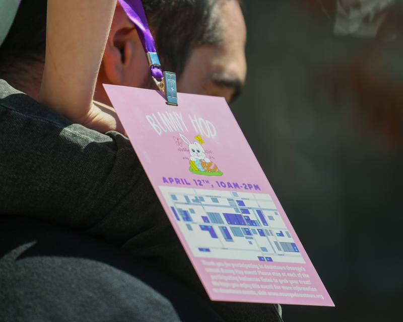 Community members were provided a lanyard with a map of all the stores that took part on the Bunny Hop event on Saturday April 12, 2025, held in downtown Oswego.