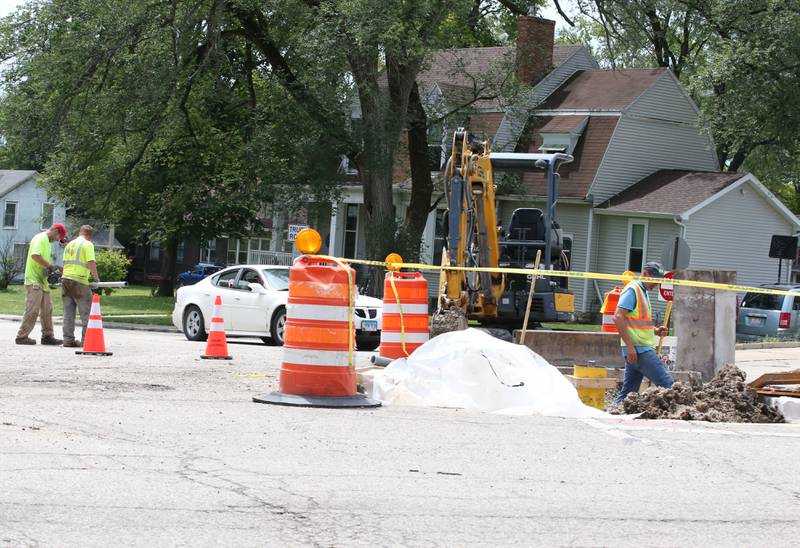 Crews work in the intersection of  West Street and U.S. 6 on Wednesday, July 31, 2024 in Peru. A long-term construction project is in full swing involving road patching, milling and resurfacing U.S. Route 6 from La Salle to Peru. In addition to roadwork, crews are rebuilding sidewalk ramps, drainage repairs, signal improvements and install raised reflectors. The 6.4 million project is expected to be fully completed by the end of summer 2025. Motorists are advised to use caution and be aware of traffic signals through the construction zones, which may cause increased wait times.