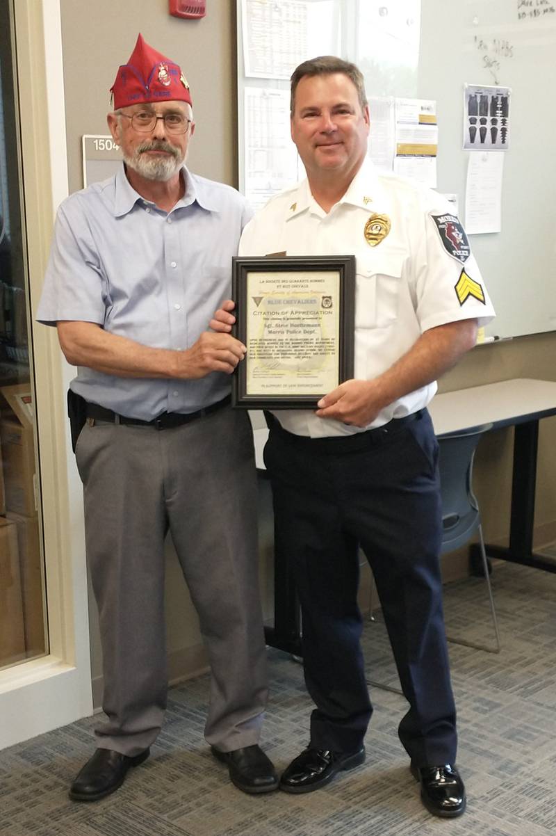 The Forty and Eight Voiture 1195 program of the Blue Chevaliers thanked retiring Sergeant Steven Huettemann with a citation for his 27 years with the Morris Police Department, service as a US Army Military Policeman and duty during Operation Desert Storm.