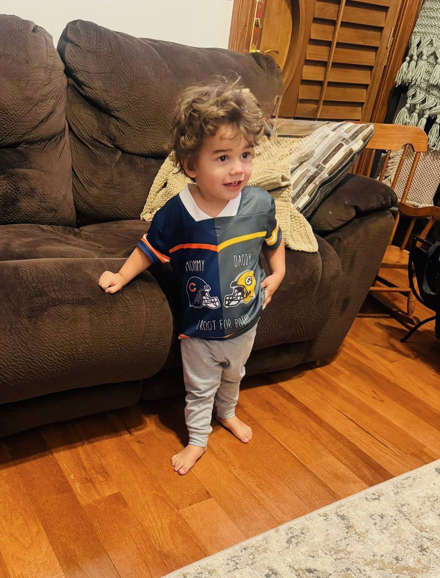 Hudson Kilanowski of La Salle is only 2 and can't venture who'll win the Bears-Packers game. But look closely at his two-tone jersey: father D.J. and mom Amber have divergent views on the matter.