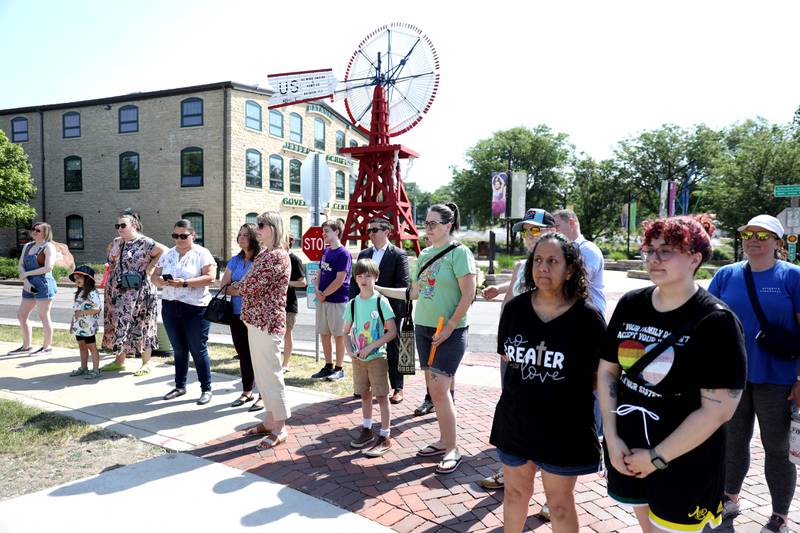 Onlookers watch as the City of Batavia kicks off Pride Month with the raising of the Pride flag across from City Hall on Thursday, June 1, 2023.