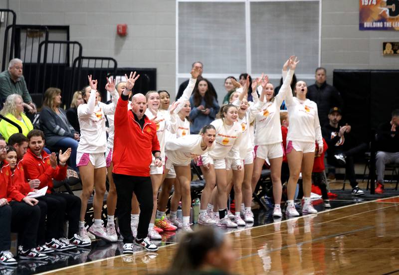 Batavia's bench erupts during the Class 4A St. Charles East Sectional final against Glenbard West on Thursday, Feb. 27, 2025 in St. Charles.